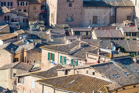 Ancient medieval buildings of Siena, Italy Stock Photo by ©jovannig 106935528