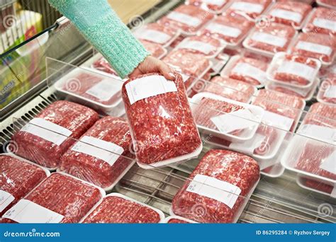 Buyer Woman Chooses Chopped Meat in Shop Stock Photo - Image of grocery ...