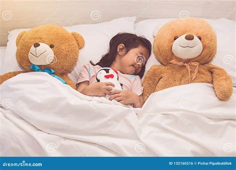 Little Girl Sleeping with Teddy Bear in Bed Stock Photo - Image of ...