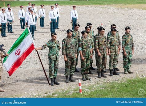 Platoon of Soldiers of the Iranian Army with the Flag of the Islamic Republic of Iran Editorial ...