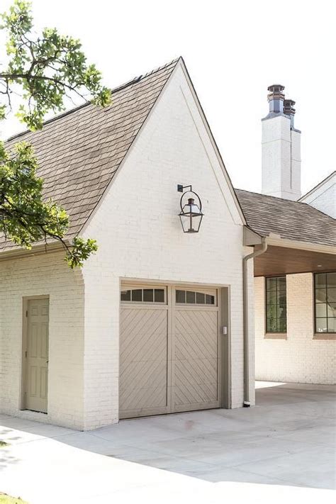 White Brick Garage with Gray Chevron Garage Door - Transitional - Garage | Brick exterior house ...