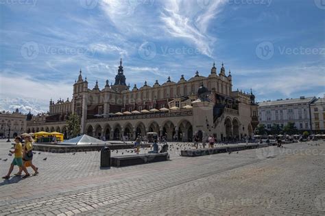 historic old town square in Krakow on a warm summer holiday day ...