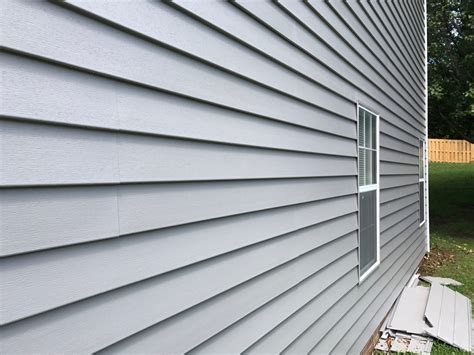 Notice how the vinyl siding appears to be seamless 1 - Belk Custom Builders