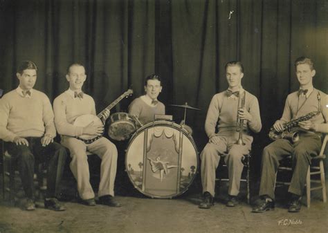 Photo of my Great Grandpa's band (he has the banjo), overall I think ...