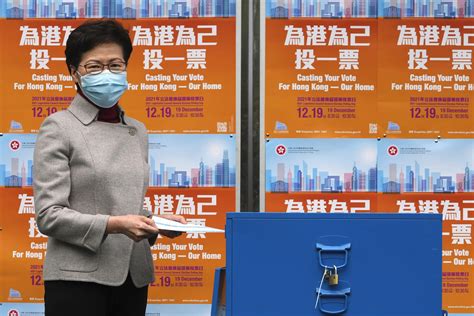 Voter turnout plunges in Hong Kong under new election laws | AP News