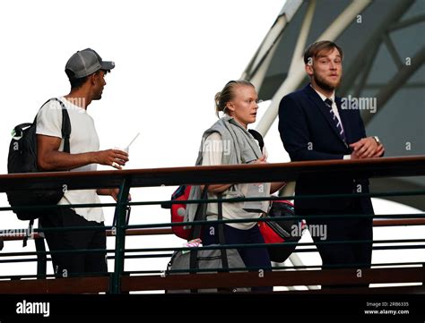 Harriet Dart walks across a bridge within the grounds on day five of ...