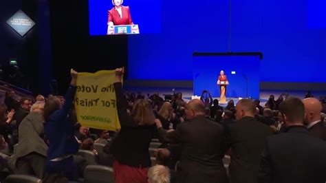 Liz Truss's conference speech interrupted by Greenpeace protesters ...