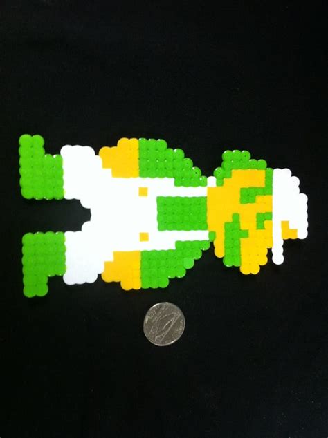 Items similar to Super Mario Bros NES "Super" Luigi Pixel Art Bead Sprite on Etsy