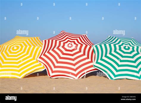 Colorful umbrellas on beach Stock Photo - Alamy