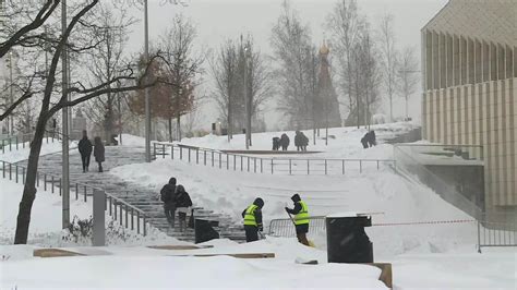 Russia: Workers continue to clear snow over the weekend, as record-breaking snowfall covers ...