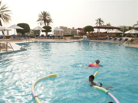 a day at the crowne plaza pool | a nomad in the land of nizwa