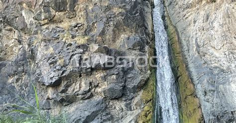 Wadi Al-Mald Waterfall in the Sarat Mountains in Jazan City, the flow ...