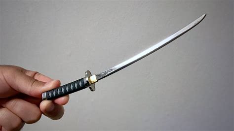 a tiny SAMURAI SWORD... but, for what? - YouTube