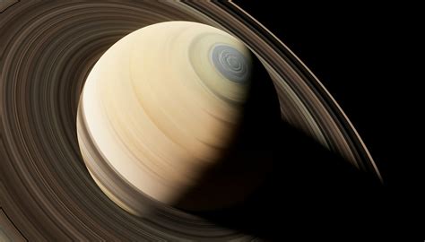 A close up of a saturn planet with a black background photo – Free Space Image on Unsplash