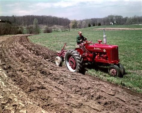 Plowing with McCormick Farmall Super M Tractor | Photograph | Wisconsin ...