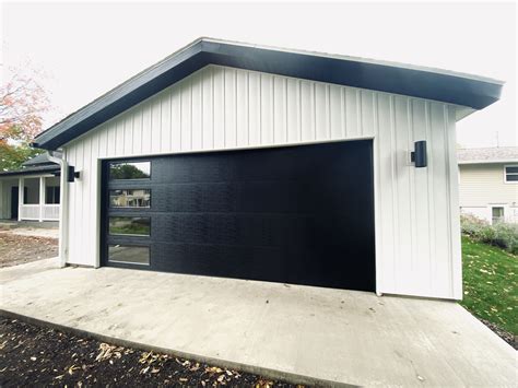 Wayne Dalton Black Garage Door | Garage door design, House exterior, Garage doors