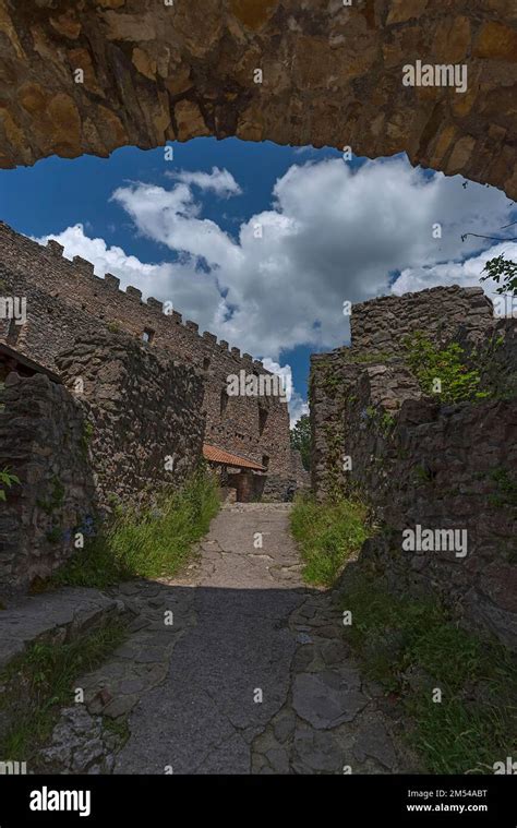 View through the entrance gate into the interior of the medieval Eisenberg castle ruins, laid ...