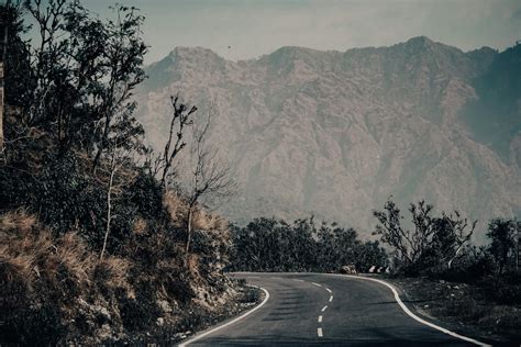 Curved Road with Mountain View · Free Stock Photo