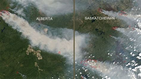 Satellite shows giant smoke plumes from Sask., Alberta forest fires ...