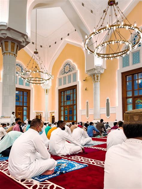 A Group of Men Sitting Inside a Mosque · Free Stock Photo