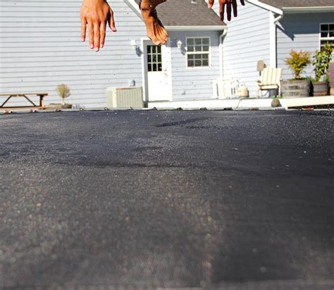 Premium Photo | Cropped image of man jumping over trampoline