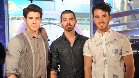 The Jonas Brothers Reunite at Star-Studded Pre-GRAMMY Party | Entertainment Tonight