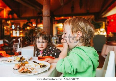 Two Messy Kids Eating Lunch Restaurant Stock Photo 1663790095 | Shutterstock