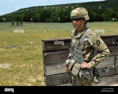 The 36th Infantry Division Headquarters and Support Company Commander, Capt. Christina Briggs ...