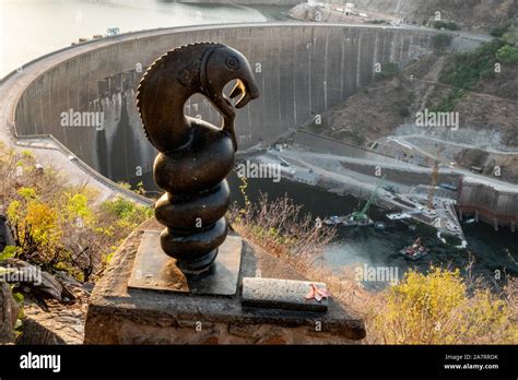 Kariba Dam Lake Kariba Zambia/Zimbabwe border on the Zambezi river & A statue of the God of the ...