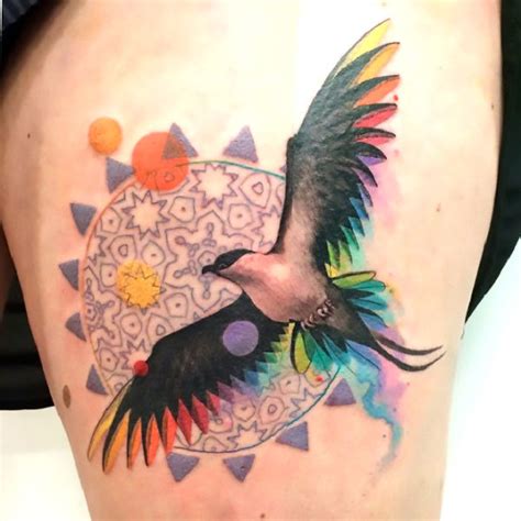 Lovely Colorful Bird Tattoo Idea