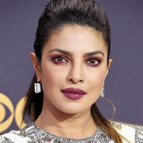 Priyanka Chopra wearing matching burgundy lipstick and eyeshadow. Celebrity Makeup Artist ...