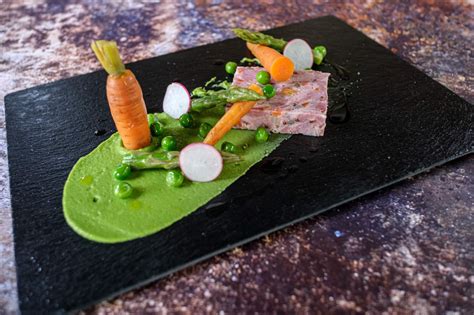 Pressed ham hock, pea puree, pickled carrot, dressed peas, asparagus ...