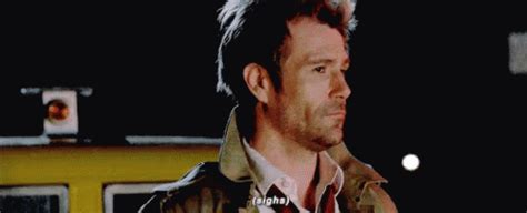 Sigh Sighing GIF - Sigh Sighing Constantine - Discover & Share GIFs