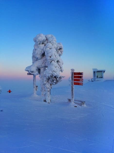 Premium Photo | Snow covered mountain top skiing ruka