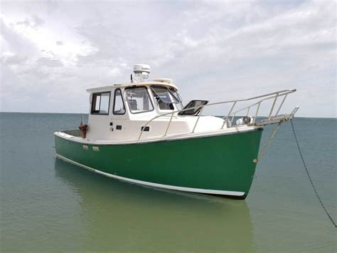 The Acadia 25 trailerable pocket trawler allows a Florida boater to ...