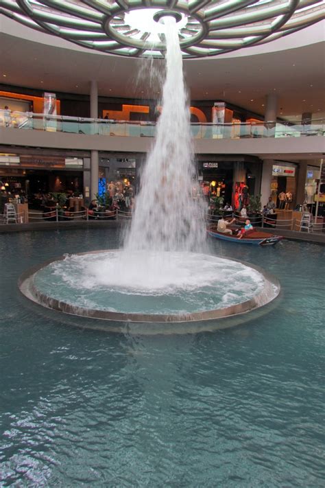 The fountain in the mall at the Marina Bay Sands in Singapore. A few ...