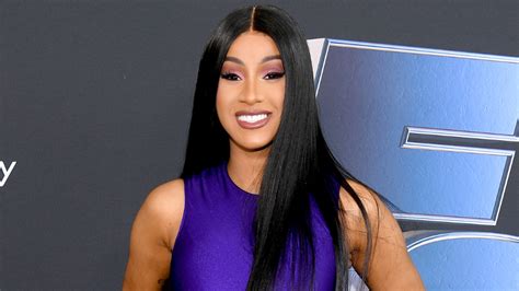 Cardi B Clarifies That She 'Wasn't Emo' After Sharing High School Photos | iHeart