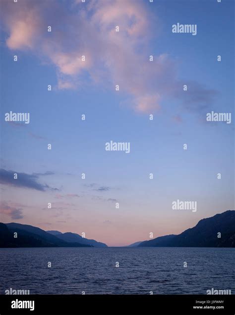 view of Loch Ness in Scotland during sunset. Looking north from a boat ...