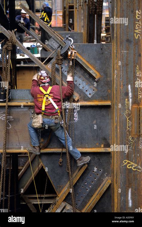 Iron worker connector works on new skyscraper in New York City Stock Photo, Royalty Free Image ...