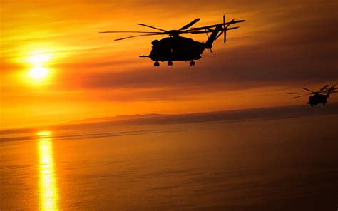 Photos Helicopters silhouettes Sikorsky CH-53 Sun sunrise and sunset