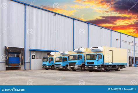 Transport Trucks Docking in Warehouse Stock Photo - Image of footer ...