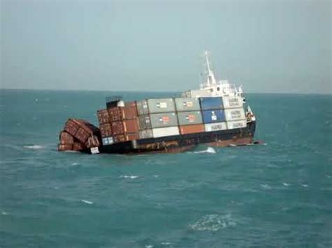 A real video of Sinking container ship at sea, crew escape & rescue operation conducted - YouTube