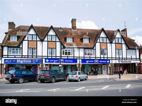 Parade of shops in the English village of Storrington, West Sussex, UK ...