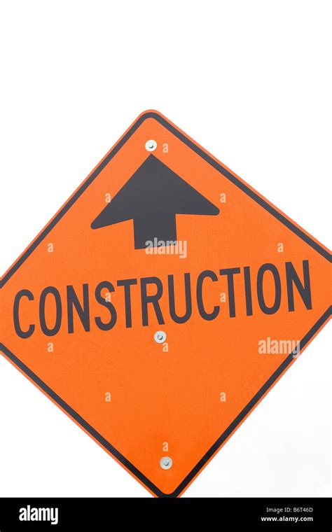 Orange construction sign Stock Photo - Alamy