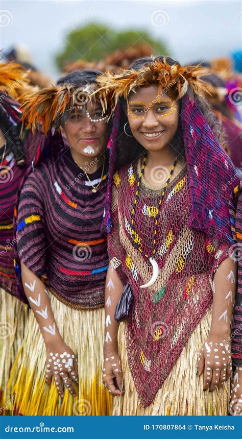 Two Woman of a Papuan Tribe in a Beautiful Crown from Bird Feathers on ...