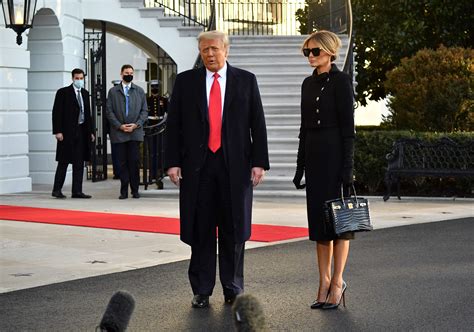 Melania Trump stuns in designer outfit with $50,000 bag while leaving White House for last time ...