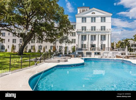 Large clear swimming pool in front of restored historic White House Hotel in Biloxi, Mississippi ...