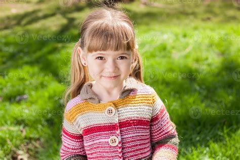 Little girl laughing and playing on the nature walk outdoors 950713 ...