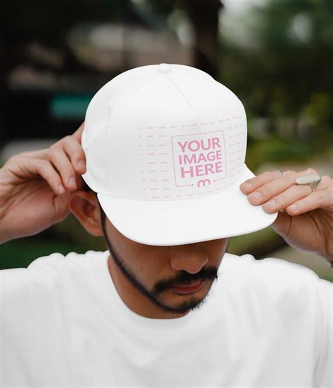 Mockup with Young Man Wearing Cap hat - Mediamodifier