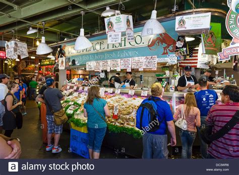 The world famous Pike Place Fish Company stall, Pike Place Market, Seattle, Washington, USA ...